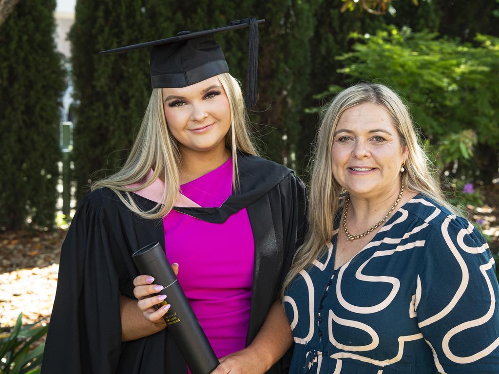 Bachelor of Education (Primary) graduate Emily Anforth is congratulated by mum Joy Anforth at a UniSQ graduation ceremony at The Empire, Tuesday, October 29, 2024. Picture: Kevin Farmer