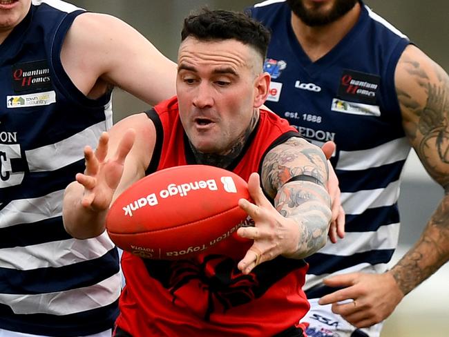 Nathan Rayment of Romsey gathers the ball during the round 16 Riddell District Football Netball League 2023 Bendigo Bank Seniors match between Romsey and Macedon at Romsey Park in Romsey, Victoria on August 5, 2023. (Photo by Josh Chadwick)