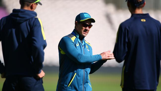 Justin Langer says both parties need to come to an agreement for the sake of the game.