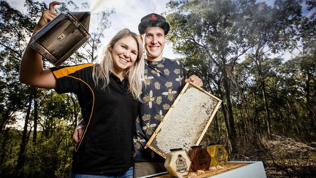 Ben and Stacey Murphy of Tambo Valley Honey show off some of their honey-making equipment. Picture: Nicole Cleary