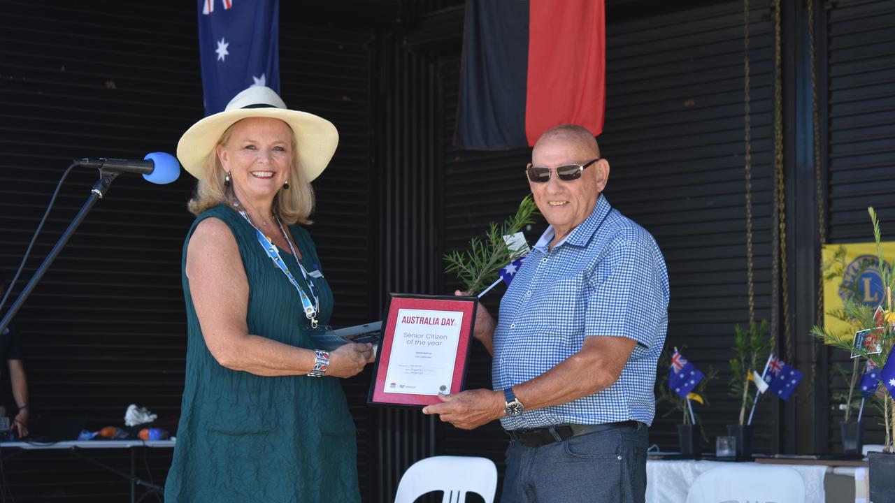 Australia Day ambassador Lyndey Milan presents the Senior Citizen of the Year award to Leo Laarhoven at the 2021 Kygole Australia Day ceremony.