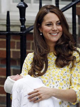 Britain's Prince William and Kate, Duchess of Cambridge and their newborn baby princess, pose for the media as they leave St. Mary's Hospital's exclusive Lindo Wing, London, Saturday, May 2, 2015. Kate, the Duchess of Cambridge, gave birth to a baby girl on Saturday morning. (AP Photo/Kirsty Wigglesworth)