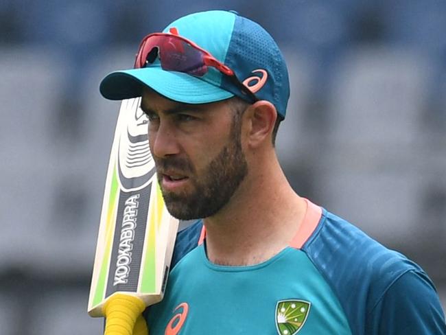 Australia's Glenn Maxwell arrives to bat in nets during a practice session at the Wankhede Stadium in Mumbai on March 16, 2023, on the eve of their first one-day international (ODI) cricket match against India. (Photo by INDRANIL MUKHERJEE / AFP) / IMAGE RESTRICTED TO EDITORIAL USE - STRICTLY NO COMMERCIAL USE