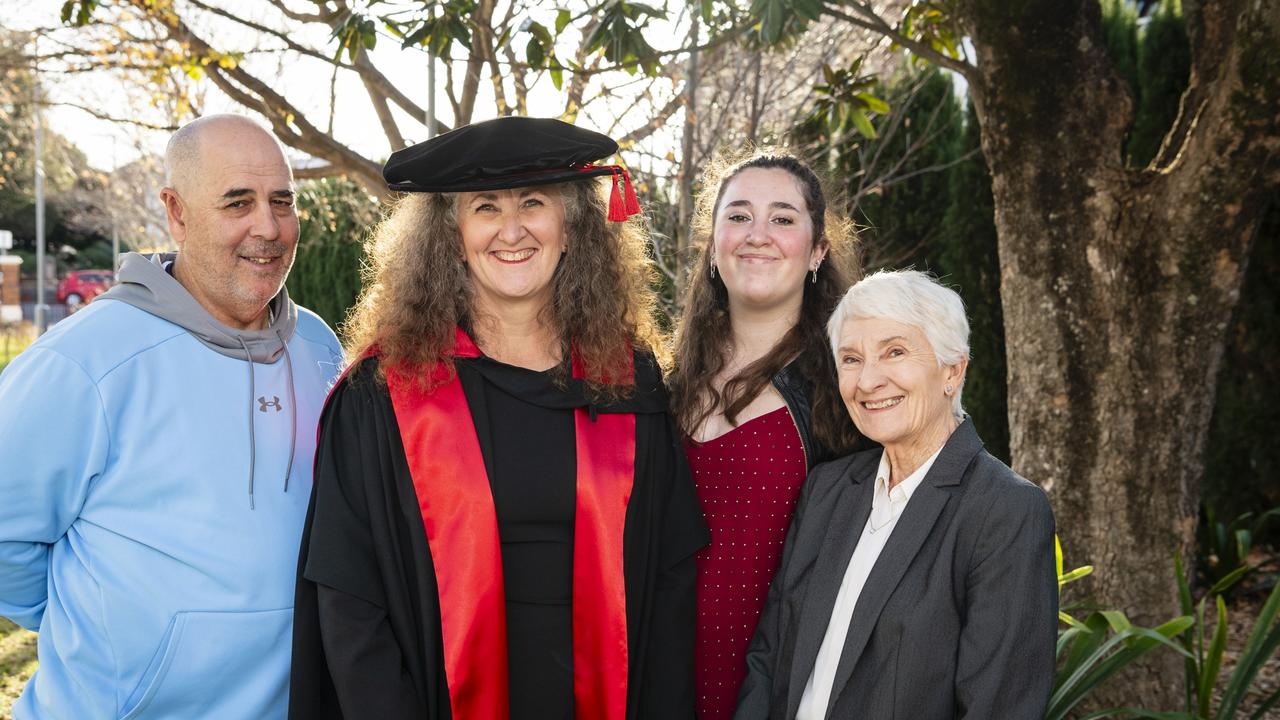 Doctor of Philosophy graduate Jane Shakespear-Druery with family (from left) Stephen Druery, Madelyn Druery and Laurel Shakespear at a UniSQ graduation ceremony at Empire Theatres, Wednesday, June 28, 2023. Picture: Kevin Farmer