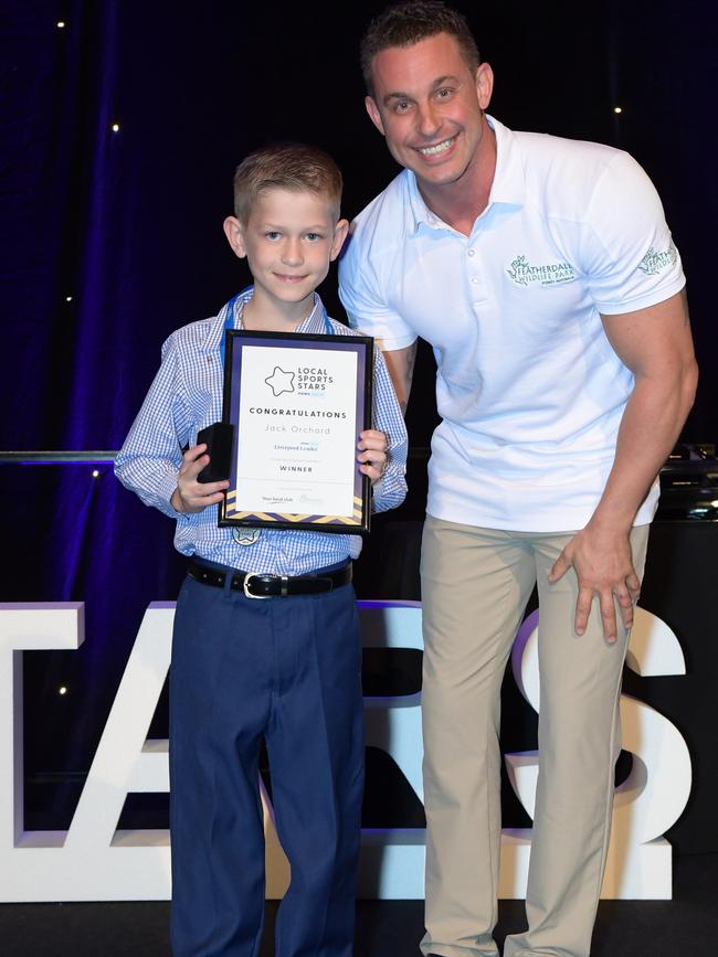 Featherdale Wildlife Park Zookeeper Chad Staples presents the Young Sporting Spirit award to Jack Orchard of the Liverpool Leader. Picture: Simon Bullard