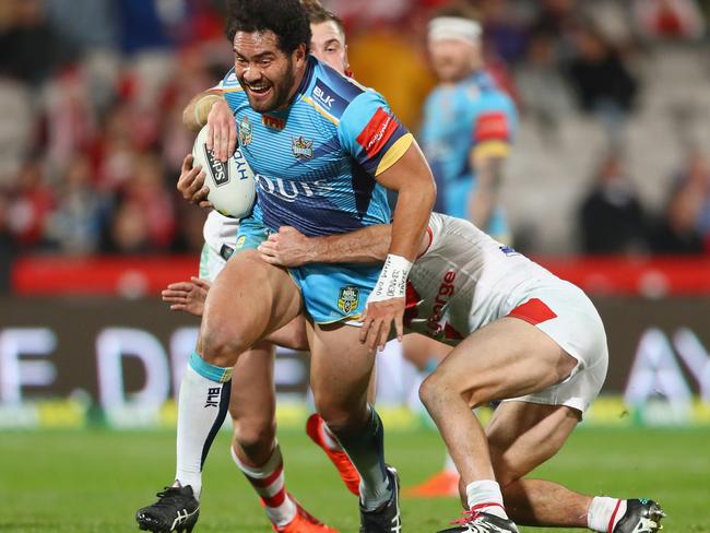 Konrad Hurrell of the Titans is tackled.