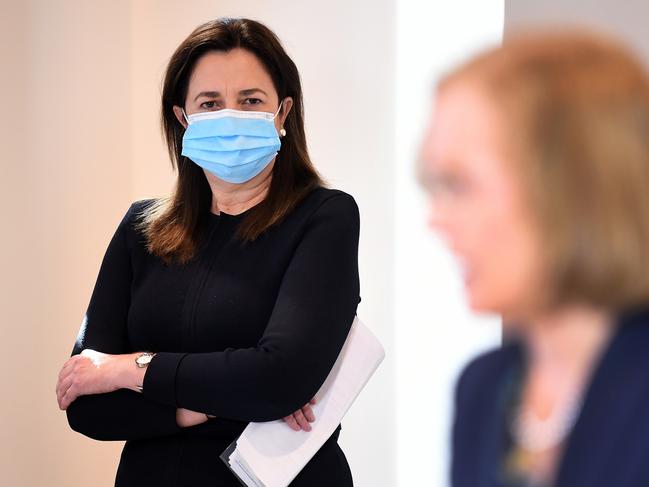 BRISBANE, AUSTRALIA - NewsWire Photos - JUNE 30, 2021.Queensland Premier Annastacia Palaszczuk watches Chief Health Officer Dr Jeannette Young during a Covid update press conference. Queensland has gone into a 3-day lockdown due to a Covid outbreak.Picture: NCA NewsWire / Dan Peled