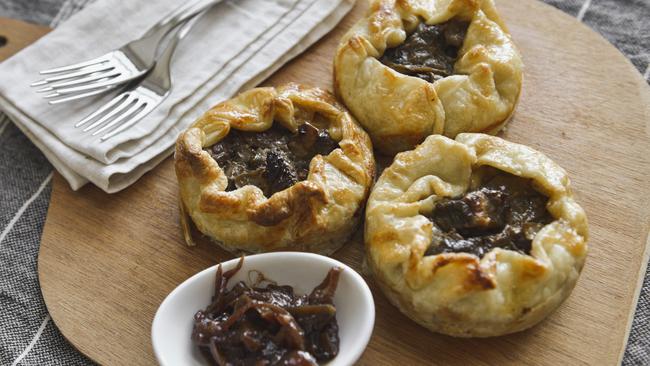 Hot treat: You can make these mini steak and mushroom pies at home. Picture: Dannika Bonser