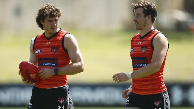 Zach Merrett, right, is still great value in KFC SuperCoach. Picture: Daniel Pockett/Getty Images