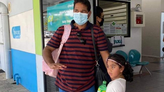 Nadesalingam Murugappan and his eldest daughter Kopika prepare to leave Christmas Island.