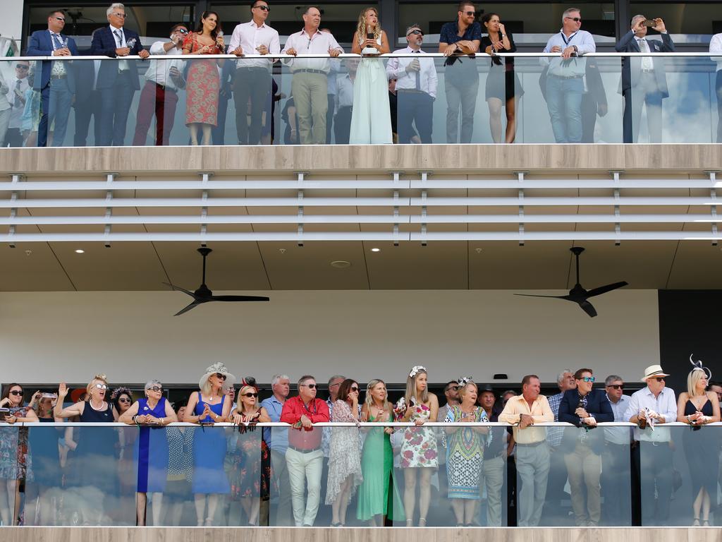 Punters watch a race from the new grandstand on Darwin Cup Day. Picture: Glenn Campbell