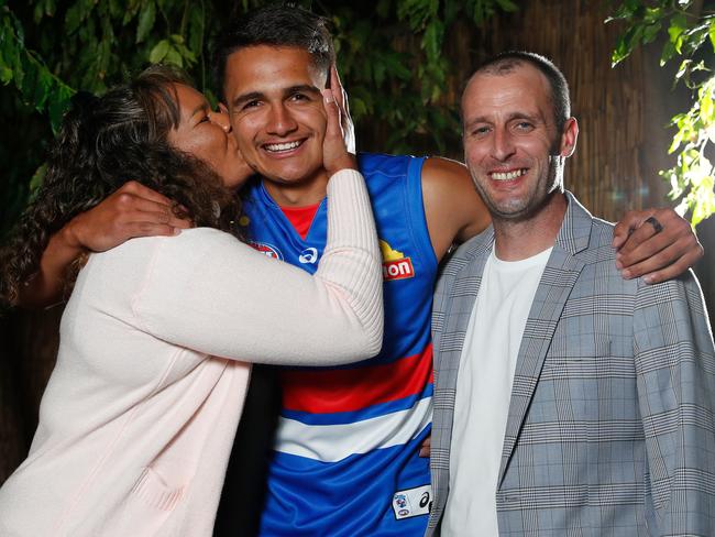 Ugle-Hagan with parents Alice and Aaron after being drafted in 2020. Picture: Michael Willson/AFL Photos