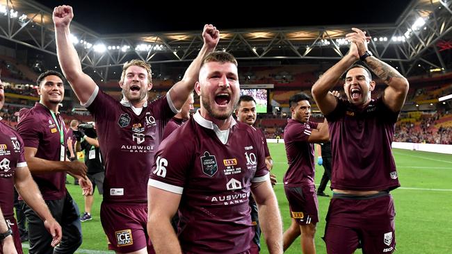 BRISBANE, AUSTRALIA - NOVEMBER 18: Jai Arrow of the Maroons and team mates celebrate victory after game three of the State of Origin series between the Queensland Maroons and the New South Wales Blues at Suncorp Stadium on November 18, 2020 in Brisbane, Australia. (Photo by Bradley Kanaris/Getty Images)