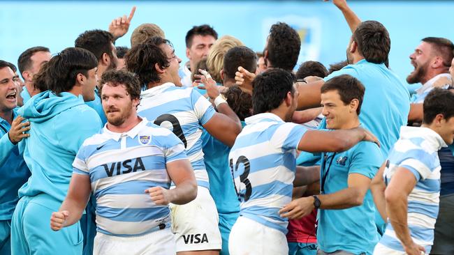 Pumas players celebrate the historic victory. Picture: Mark Kolbe/Getty