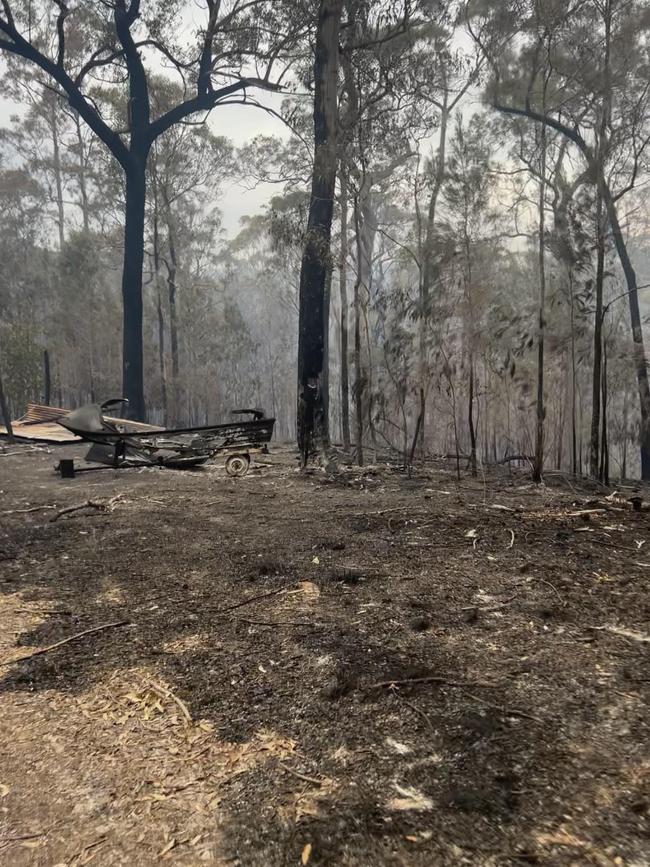 The Bermagui fire has destroyed a boat at Barragga Bay on the Tathra Bermagui road. Picture: Jay Goodwin