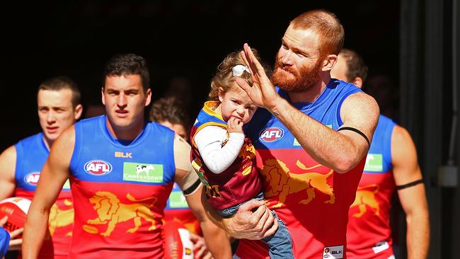 Daniel Merrett walks on to the ground for his last game.
