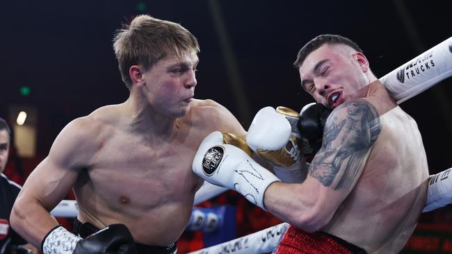 Nikita Tszyu (L) exchanges punches with Benjamin Bommber during their Super-welterweight bout at Margaret Court Arena. Picture: Getty Images