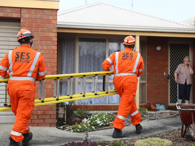 SES volunteers respond to a call for help in Grovedale after wild storms hit the region. Picture: Alison Wynd