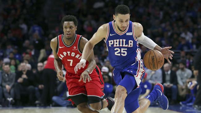 Ben Simmons streaks away from Raptors guard Kyle Lowry. Pic: AP Schultz)