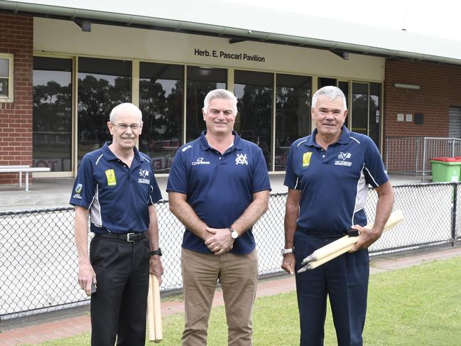 Cricket Victoria CEO Andrew Ingleton (middle) with umpires Darrell Holt and Dan Bomford.