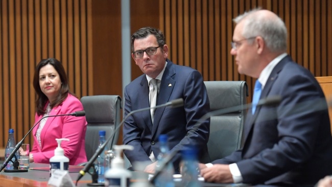 Prime Minister Scott Morrison (right) together with Premiers Annastacia Palaszczuk (left), Daniel Andrews (centre) are seen during a national cabinet meeting. Picture: Sam Mooy/Getty Images