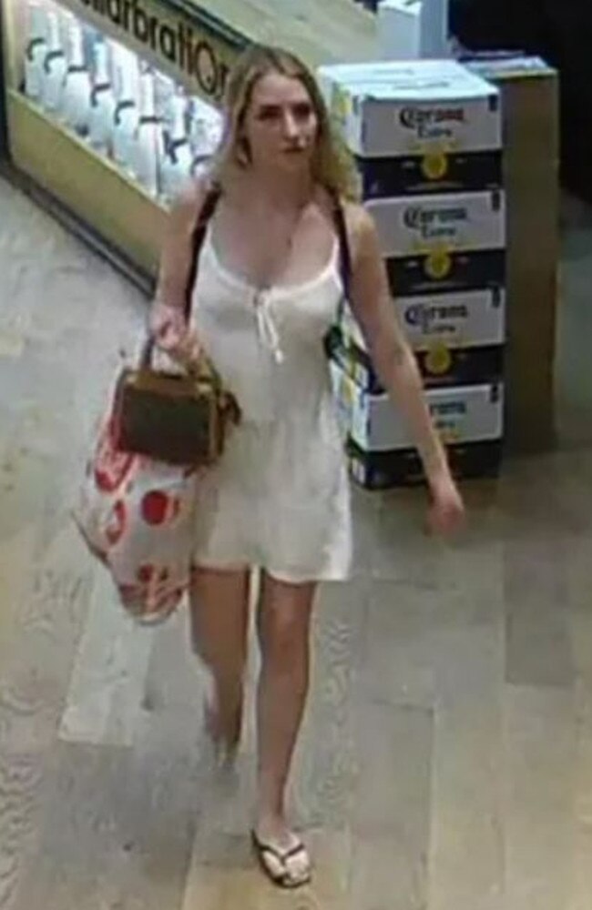 Police want to speak to this woman who they believe may have information about the theft of alcohol from a liquor store at Broadbeach. Picture: Queensland Police Service