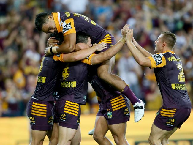 James Roberts of Brisbane celebrates his try during the NRL match between the Brisbane Broncos and the North Queensland Cowboys. Pic Darren England