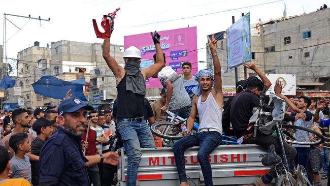 Palestinians in the Gaza Strip celebrating after Hamas's deadly October 7 raids on Israel. Picture: AFP