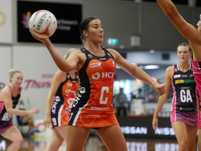 GWS Netball centre Amy Sligar has a great overhead pass. Photo: Sarah Reed/Getty Images