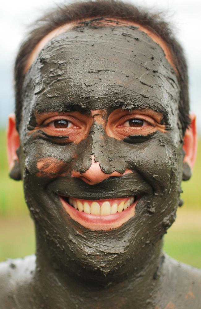 Brisbane based travel blogger Anthony Bianco having a mud bath in Fiji, near Nada, in 2010.