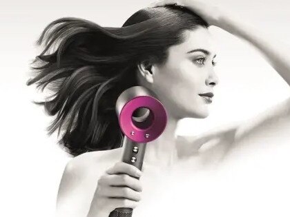 The Dyson Supersonic hair dryer in action.