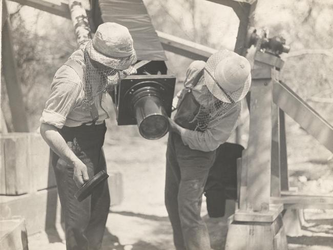 Scientists of the Wallal expedition with a heliograph, one of the large cameras used to capture the images of the eclipse in 1922.