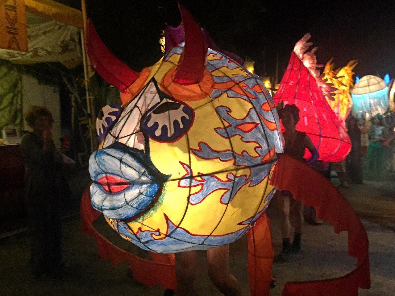 Woodford Folk Festival: Characters light up at night.