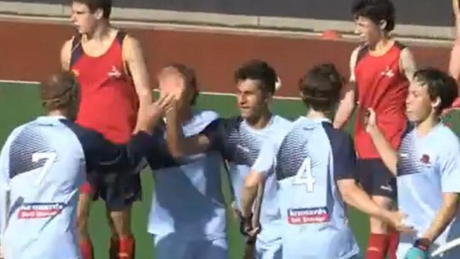 Grafton's Tyler Gaddes (No.7) congratulates teammates after NSW State opened its account against South Australia in their first match of the 2021 Australian Under-18 Boys Hockey Championships at Launceston on Thursday, 8th April, 2021.