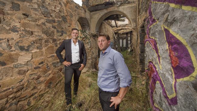 Daniel Lyne and architect Dom Certantonio at the shell of the Diggers Rest Hotel in February this year. Picture: Rob Leeson