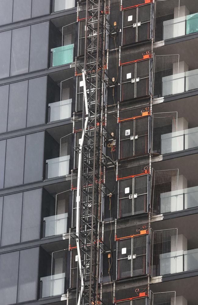 Gold Coast battered by Cyclone Alfred, as it made land. A pipe swaying dangerously in the wind off a Broadbeach construction site caused Old Burleigh Rd to be closed. Picture Glenn Hampson