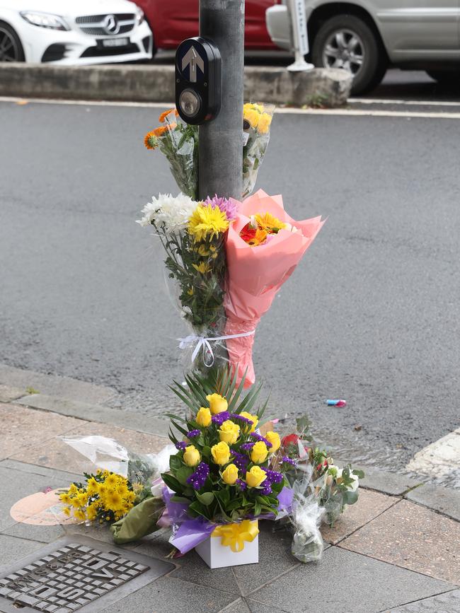 Flowers left at the corner of Flood and Marion Streets in Leichhardt. Picture: David Swift