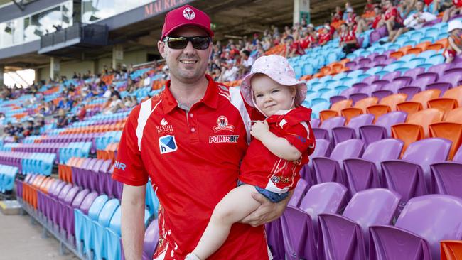 Father and daughter Rohan and Lucy Langworthy enjoying the NTFL prelim finals on Saturday afternoon. Picture: Floss Adams.