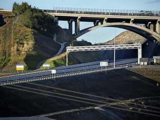 POLL OF TOLL: A toll point and signs for toll payment provider Linkt under construction on the Toowoomba Second Range Crossing. Picture: Kevin Farmer