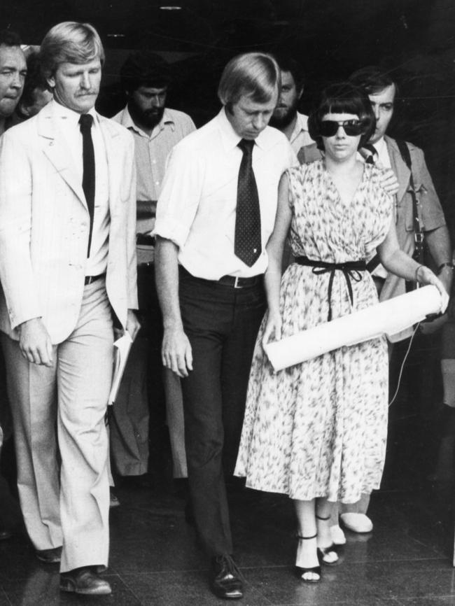 Michael and Lindy Chamberlain, close to tears as they leave the Alice Springs court building after the Coroner's finding on February 20, 1981.