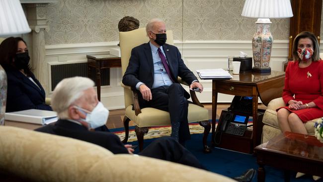 US President Joe Biden and US Vice President Kamala Harris meet with House Majority Leader Steny Hoyer, Speaker of the House Nancy Pelosi, and others during a meeting about the economy and COVID relief. Picture: AFP.