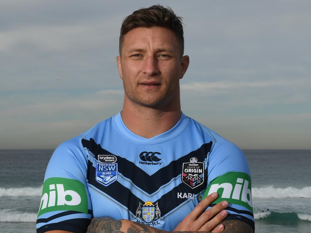 The NSW Blues' Tariq Sims poses for a photograph at Bondi Beach following the official team photo during a media session in Sydney, Tuesday, July 2, 2019. Game three of the NRL State of Origin series will be played at ANZ Stadium on Wednesday July 10th. (AAP Image/Dean Lewins) NO ARCHIVING