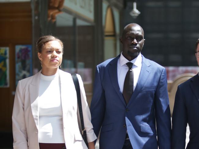 SYDNEY, AUSTRALIA - NewsWire Photos - 05 MARCH 2025:Ruon Tongyik (C) leaves the Downing Centre in Sydney.Picture: Christian Gilles / NewsWire