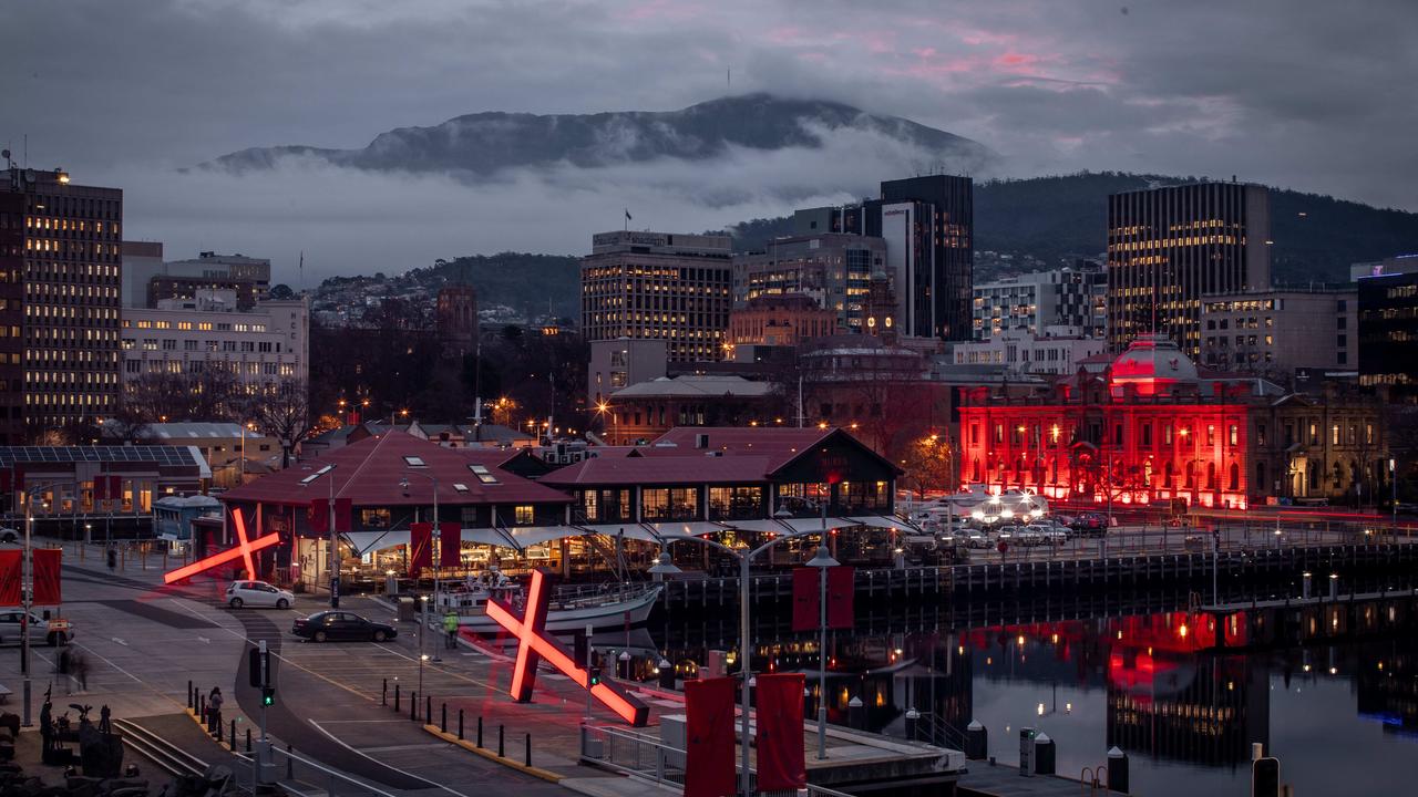 Crosses on the Hobart waterfront as part of Dark Mofo 2021. Picture: Darklab