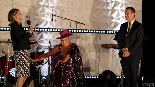 Chief public health officer Nicola Spurrier, Hans and South Australian Premier Steven Marshall on stage after Adelaide cabaret performer Hans performs for hotel guests. Picture: Kelly Barnes/Getty Images