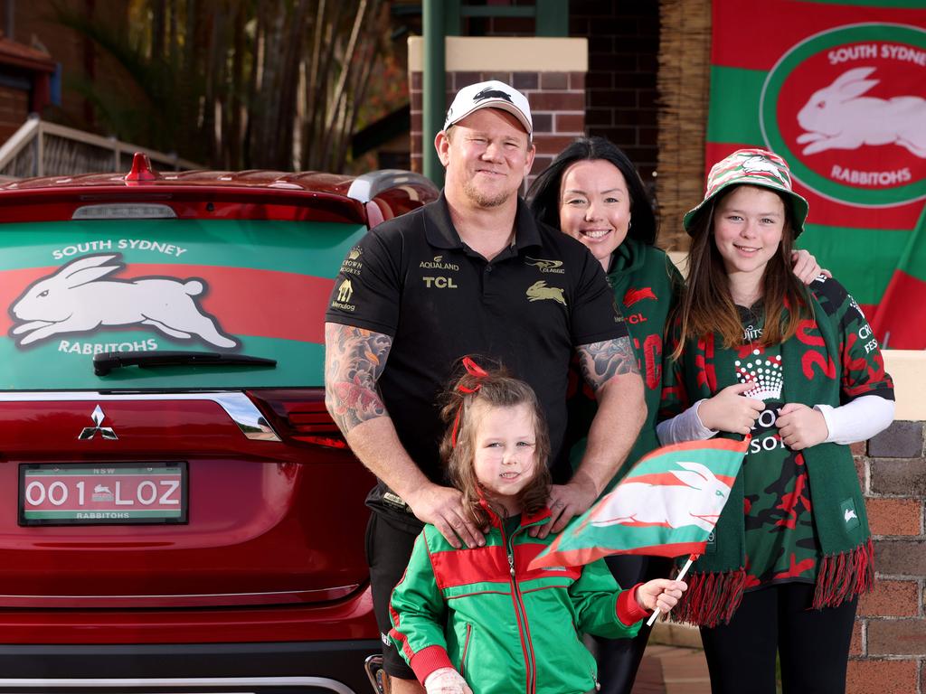 Rabbitohs Fans Mark Rayner pictured with his wife Lauren and their kids Madisyn (5) and Olivia (11) at their Five Dock home. Mark is the great-nephew of Souths legend Jack Rayner. Park.Picture: Damian Shaw