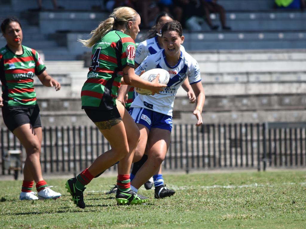 Kate Fallon is looking to be tackled by Ambryn Murphy-Haua. Picture: Sean Teuma/NewsLocal