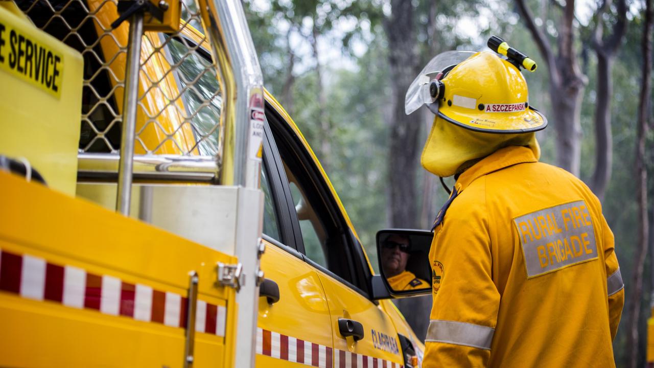 Queensland Fire Department crews remain on scene at a grass fire in the Darling Downs region that began burning around noon on Sunday.