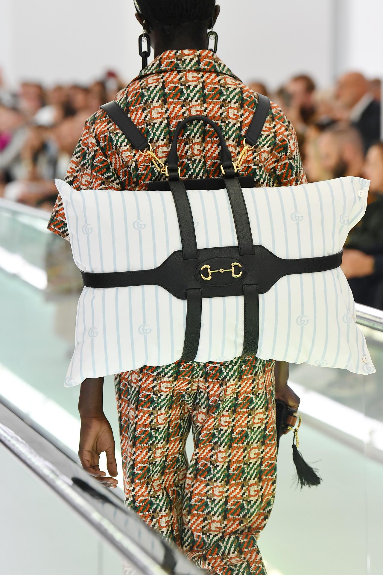 Gucci s new pillow backpacks are here to help you travel in