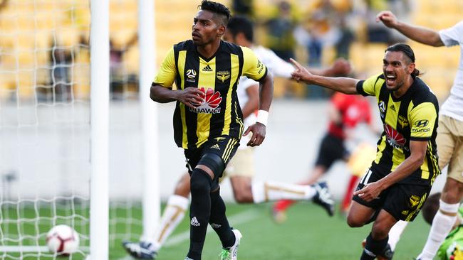 Wellington’s Roy Krishna celebrates, left, with David Williams after scoring against Newcastle Jets at Westpac Stadium in Wellington. Picture: Getty Images